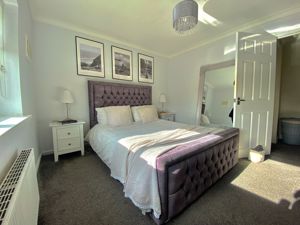 Bedroom One- click for photo gallery